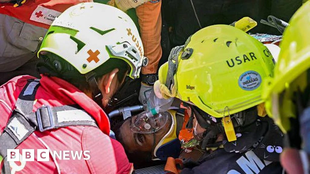 Venezuela quake survivor pulled out alive after eight days